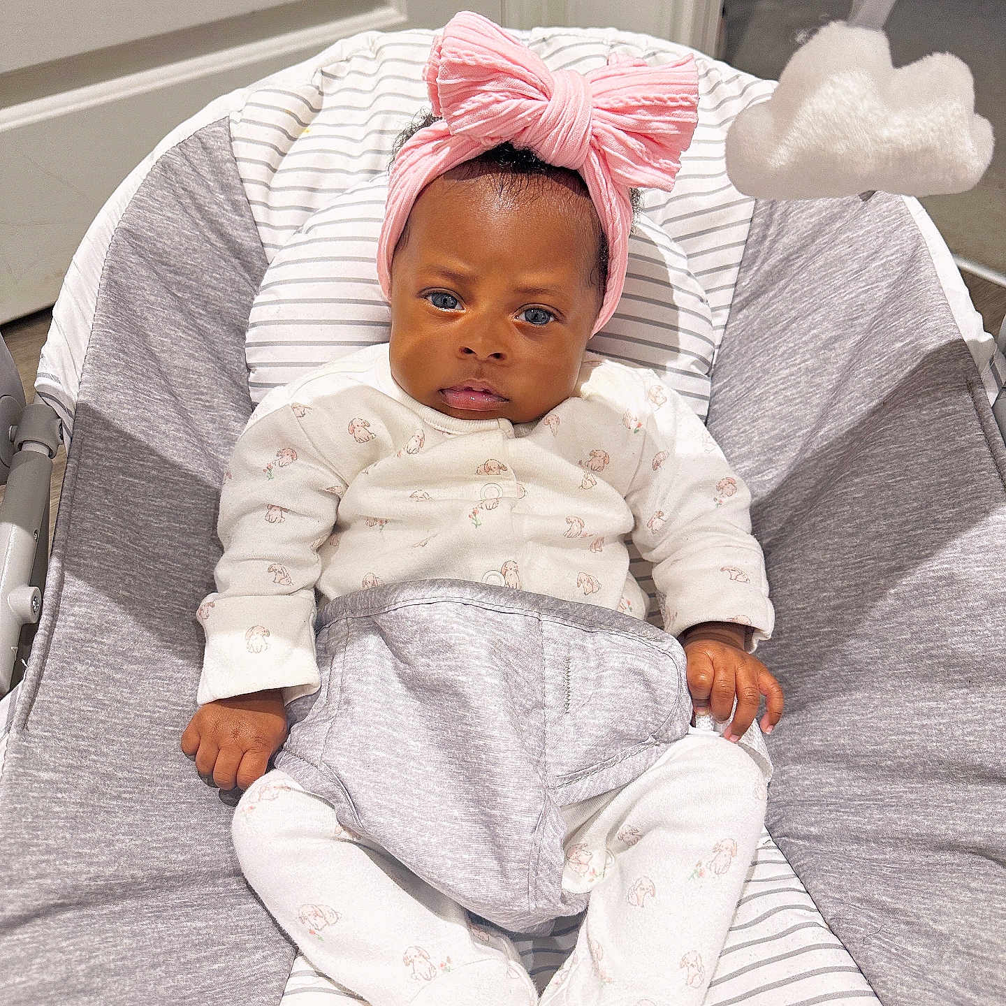 Zya is registered to the contest to win money with this photo: baby, bed, blanket, bonnet, clothing, cradle, crib, cushion, face, furniture, happy, hat, head, homedecor, infantbed, person, photography, portrait, smile, standing