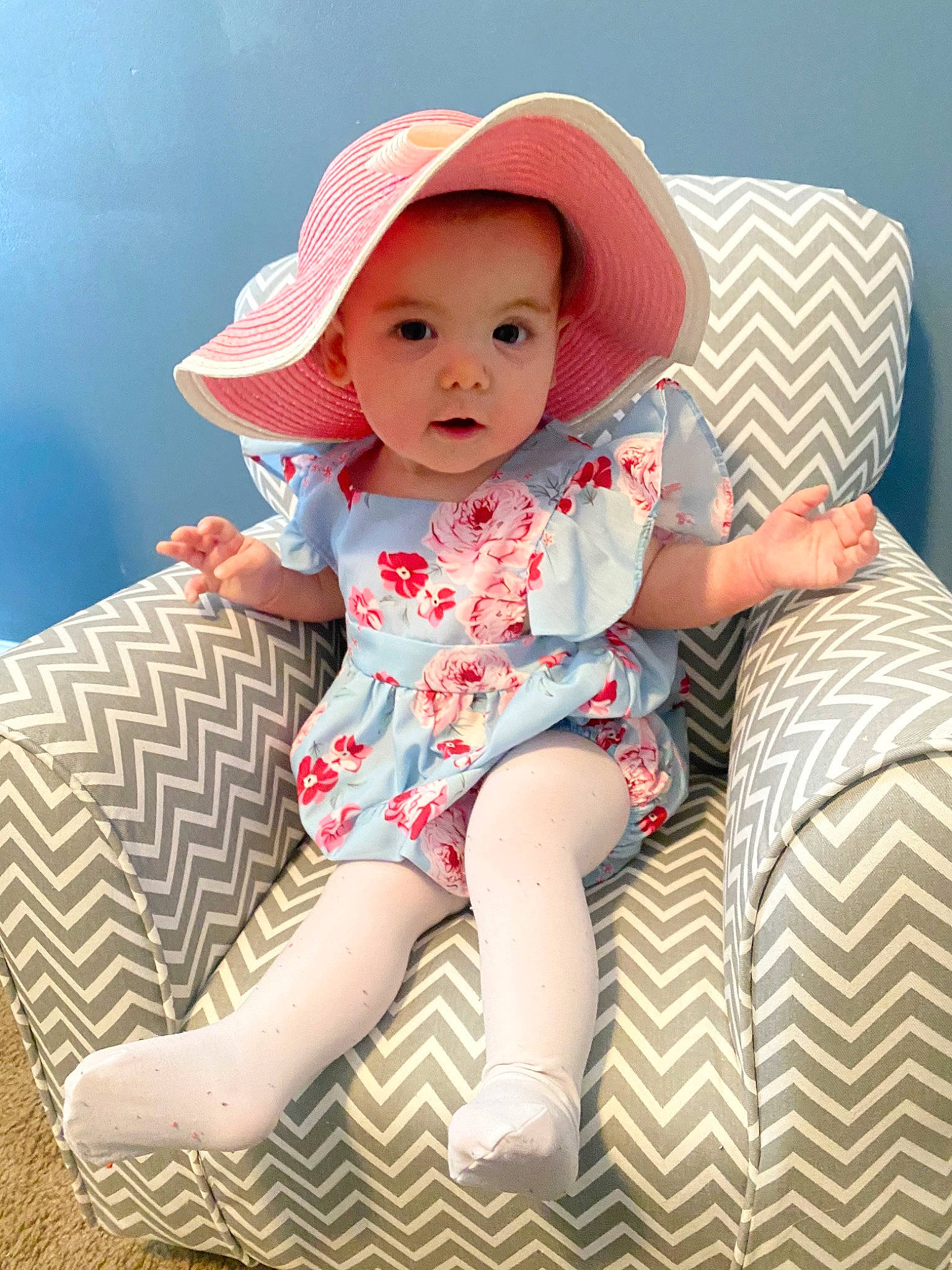 Adeline joined the competition — help win amazing prizes! baby, baby_toddler_clothing, child, hat, headgear, person, pink, sitting, skin, sun_hat, toddler