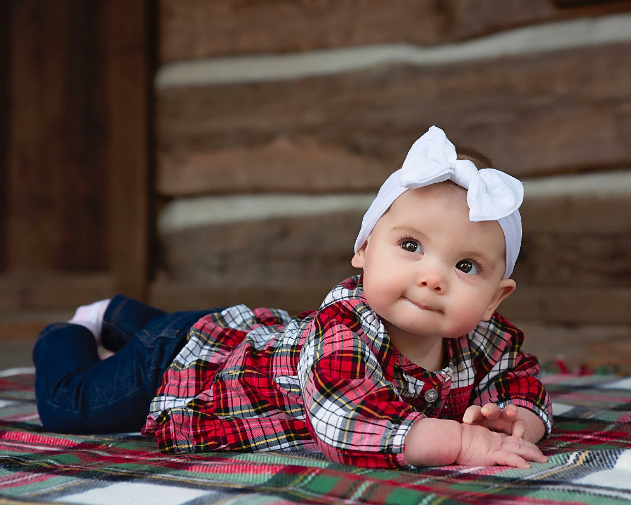 Adeline is registered to the contest to win money with this photo: baby, cheek, child, child_model, design, eye, hair_accessory, head, headgear, pattern, person, photograph, photography, plaid, portrait_photography, sitting, skin, tartan, textile, toddler