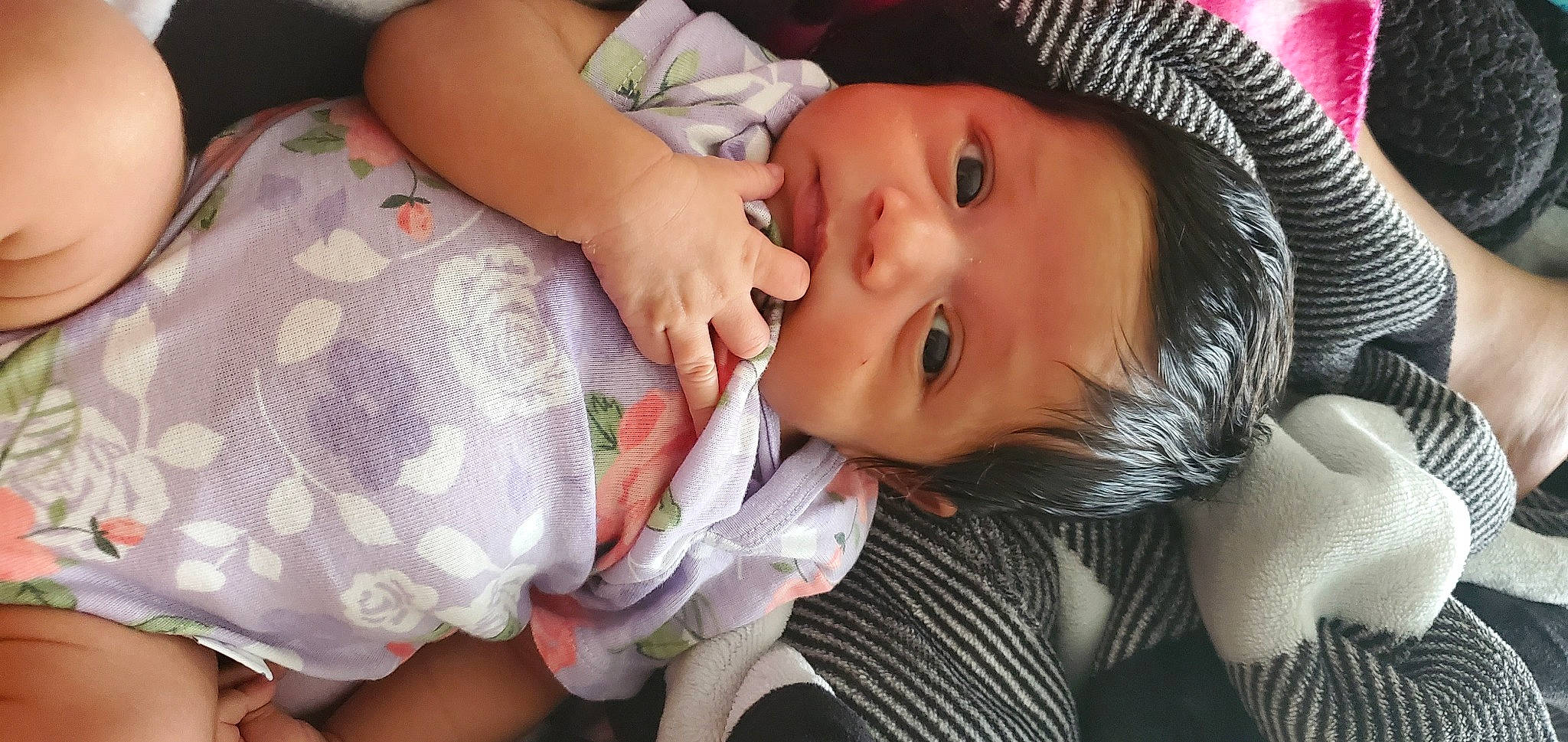 Ava is registered to the contest to win money with this photo: baby, baby_toddler_clothing, cap, cheek, child, eye, eyelash, fashion_accessory, finger, happy, hat, iris, lip, mouth, nail, nose, person, skin, textile, thumb