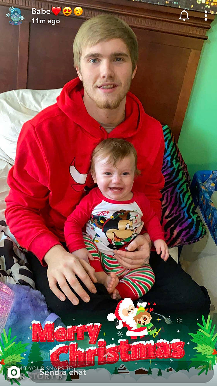 Zander is registered to the contest to win money with this photo: child, christmas, christmas_eve, family, holiday, joy, person, play, smile, toddler