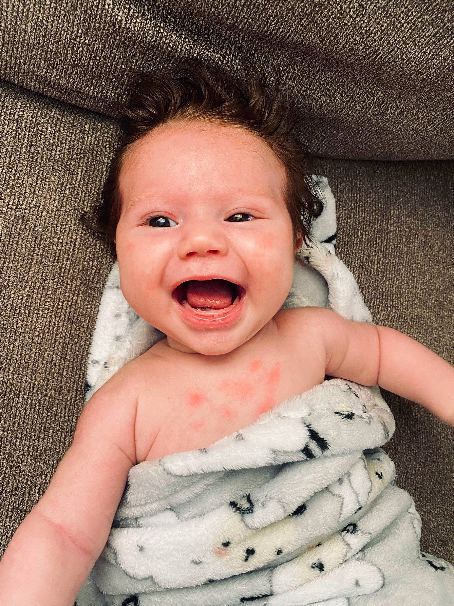 Brooks is registered to the contest to win money with this photo: baby, baby_toddler_clothing, cheek, child, comfort, eye, finger, flash_photography, gesture, happy, jaw, lip, mouth, nail, nose, organ, person, skin, smile, thumb