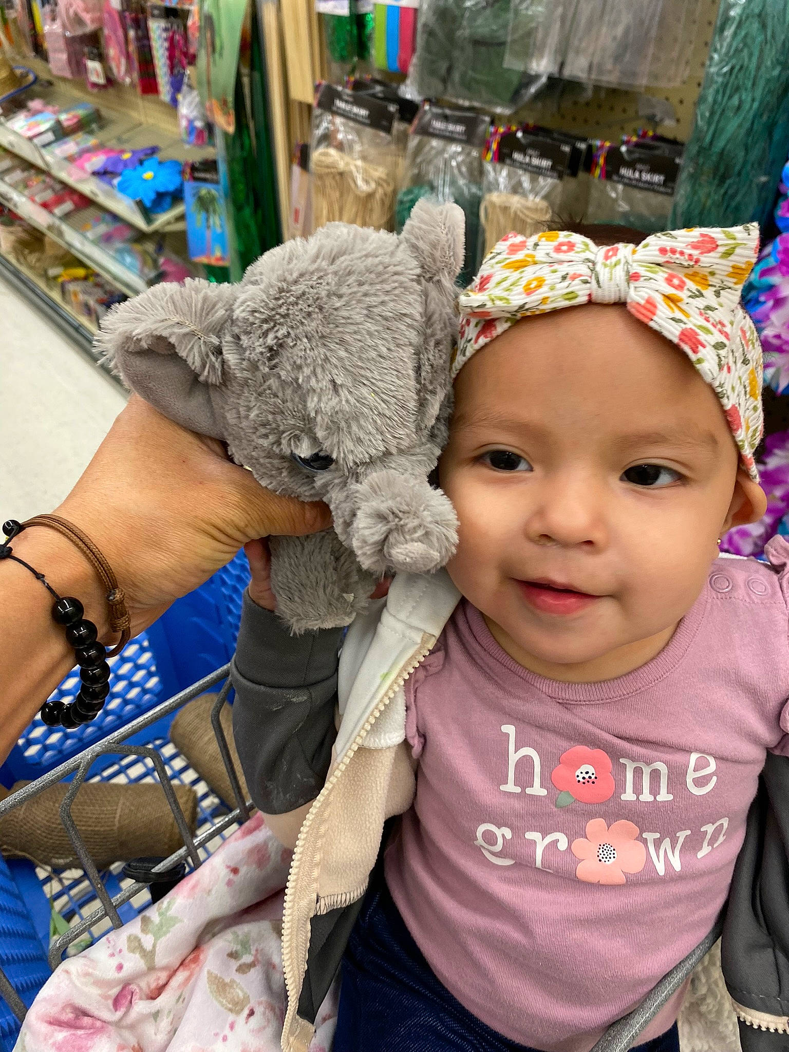 Julia joined the competition — help win amazing prizes! cap, child, city, community, event, fashion_accessory, fun, hairstyle, happy, headgear, headwear, human, joy, market, person, shelf, street, summer, t_shirt, textile