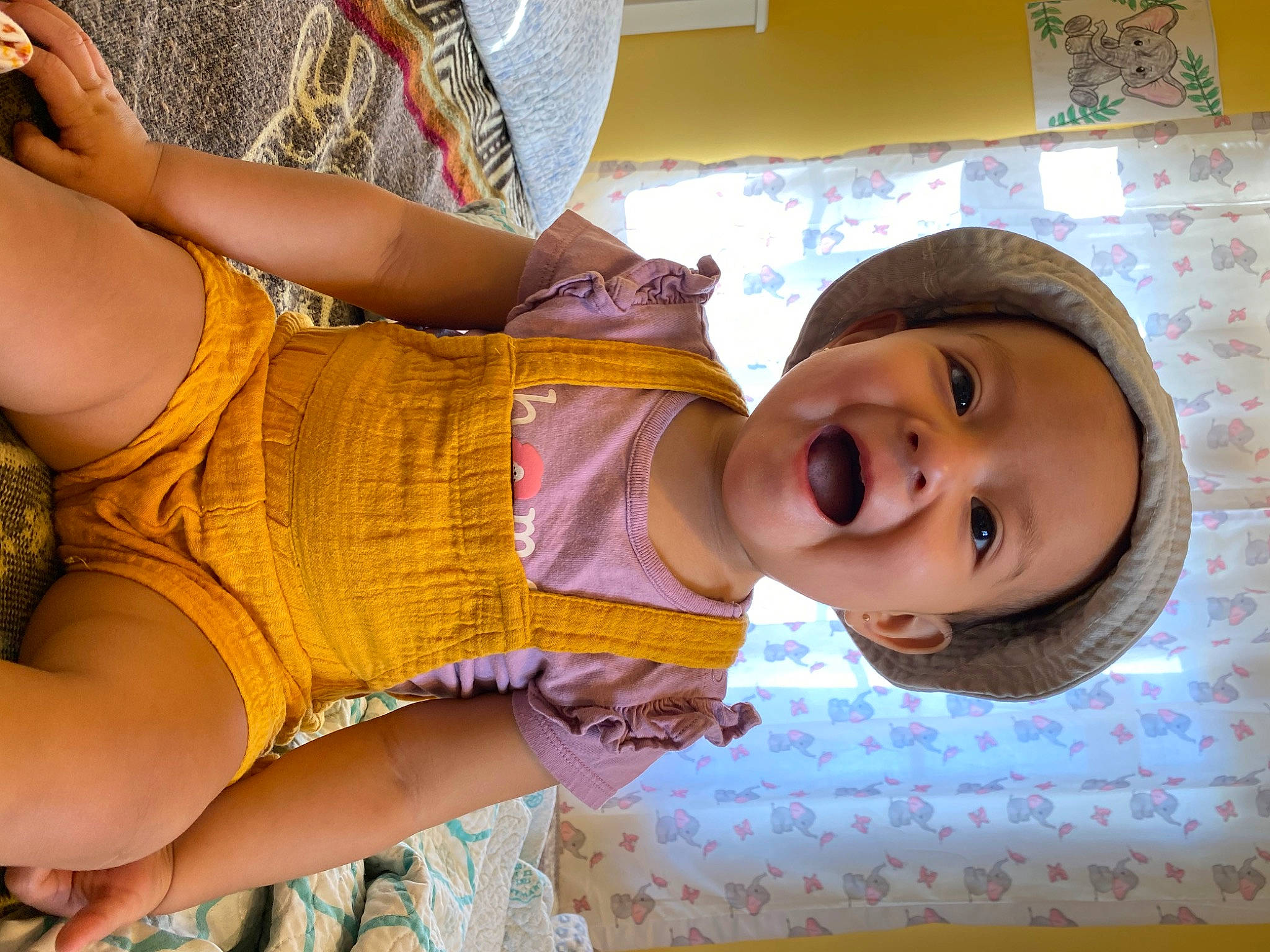 Julia is registered to the contest to win money with this photo: abdomen, baby_toddler_clothing, cheek, chest, child, eye, facial_expression, fun, happy, human_body, human_leg, leisure, mouth, neck, person, skin, smile, thigh, toddler, trunk