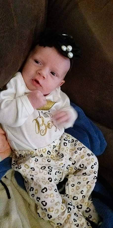 Laura joined the competition — help win amazing prizes! baby, baby_products, baby_toddler_clothing, cheek, child, comfort, drinkware, facial_expression, happy, hat, lip, nightwear, pattern, person, portrait_photography, sitting, skin, sleeve, textile, toddler