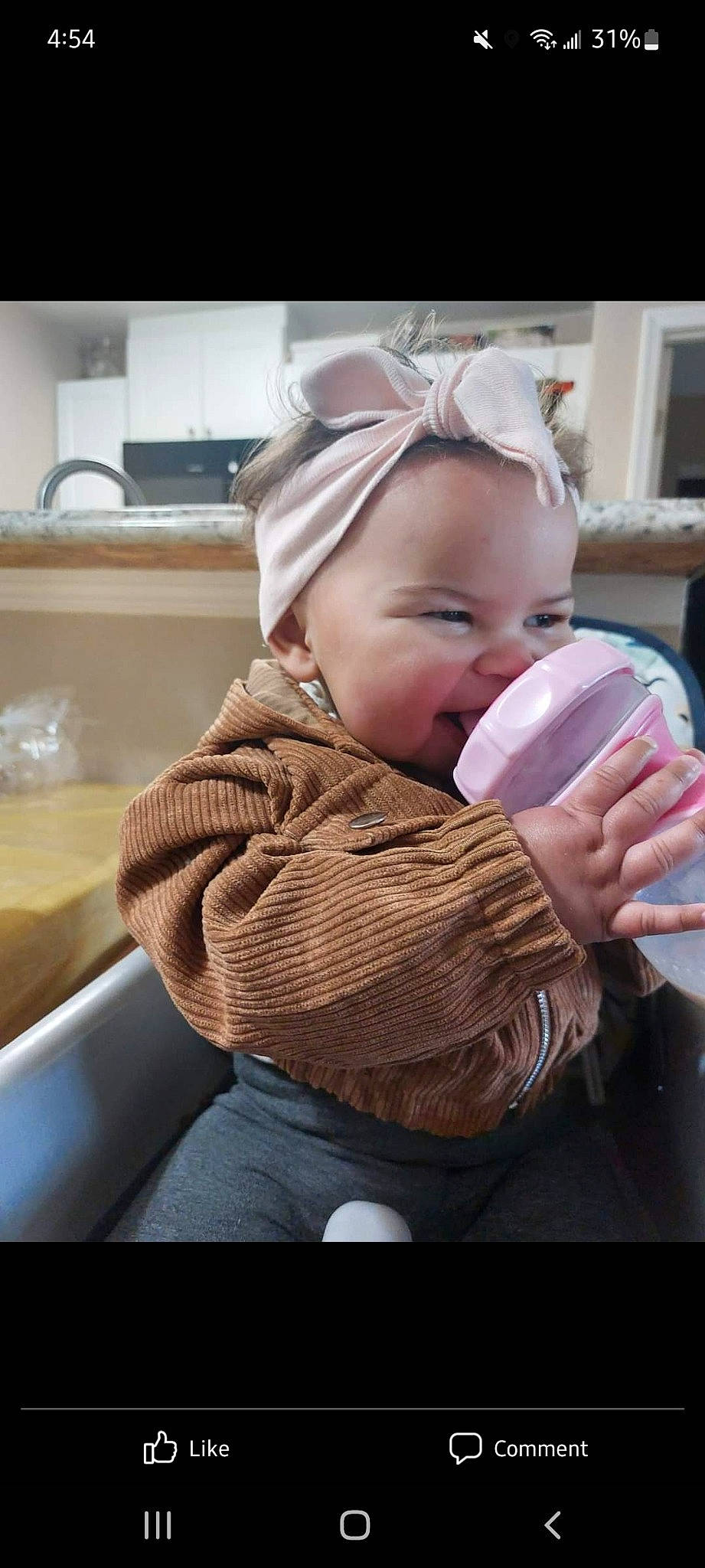 Dorothy is registered to the contest to win money with this photo: baby, baby_products, baby_toddler_clothing, cap, cheek, child, comfort, drinking, finger, fun, gesture, happy, hug, leisure, mouth, person, room, sitting, skin, sleeve