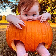 Evangeline is registered to the contest to win money with this photo: baby, pumpkin, grass, outdoor, child, cute, autumn, nature, feet, hands, orange, fall, seasonal, playful, smiling, face, skin, barefoot, sunlight, tree
