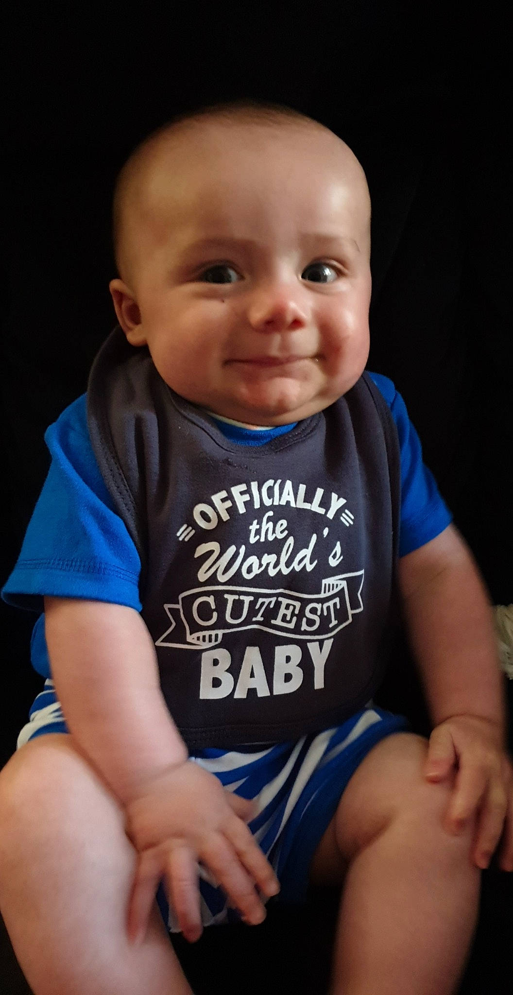 Hunter joined the competition — help win amazing prizes! baby, baby_products, baby_toddler_clothing, blue, cheek, child, face, facial_expression, head, human, joy, person, photography, product, sitting, skin, sleeve, smile, t_shirt, toddler