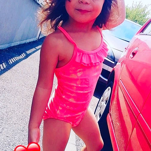 Djenny a rejoint le concours — aidez-le/la à gagner de superbes lots ! automotive_design, automotive_lighting, car, chest, dress, happy, hood, leg, leotard, motor_vehicle, one_piece_swimsuit, person, pink, red, sportswear, swimwear, thigh, vehicle, vehicle_door, waist