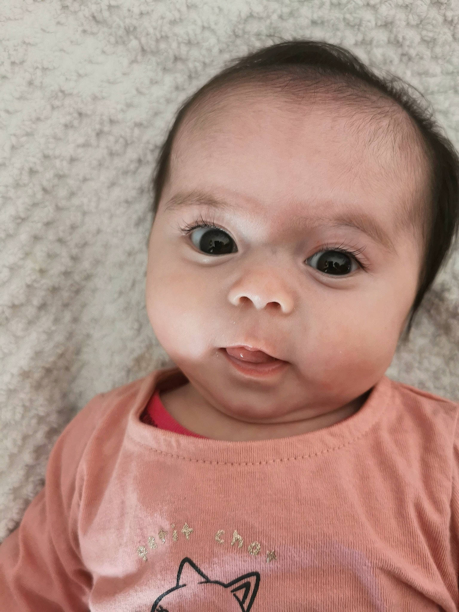 Enora participe au concours pour gagner de l'argent avec cette photo : baby, baby_toddler_clothing, cheek, child, chin, ear, eyebrow, eyelash, forehead, hairstyle, happy, iris, lip, mouth, neck, nose, person, skin, sleeve, smile