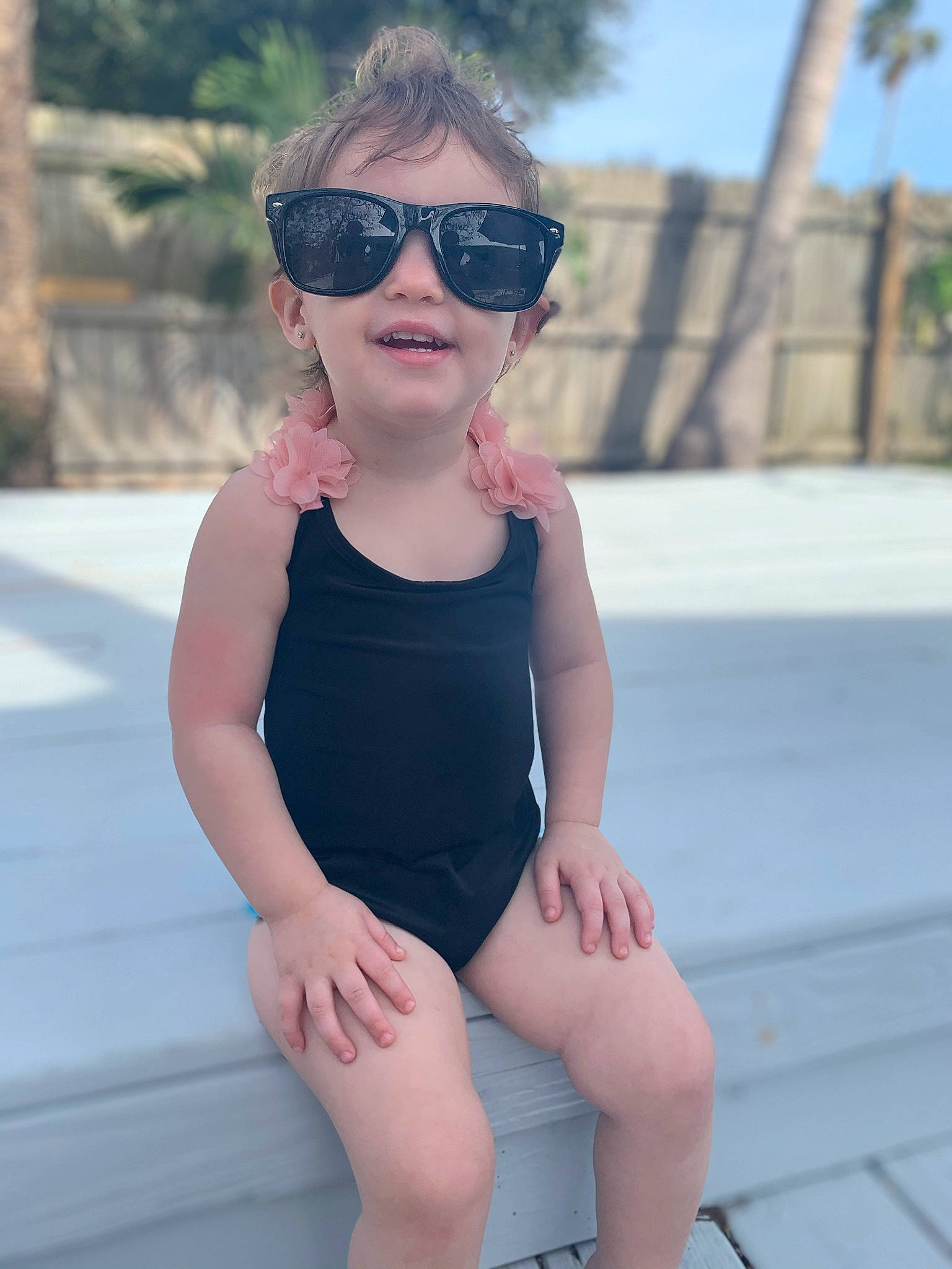 Makenna joined the competition — help win amazing prizes! beauty, child, cool, eyewear, glasses, leg, lip, person, personal_protective_equipment, photo_shoot, photography, shorts, sitting, skin, sleeveless_shirt, summer, sunglasses, thigh, vacation, vision_care