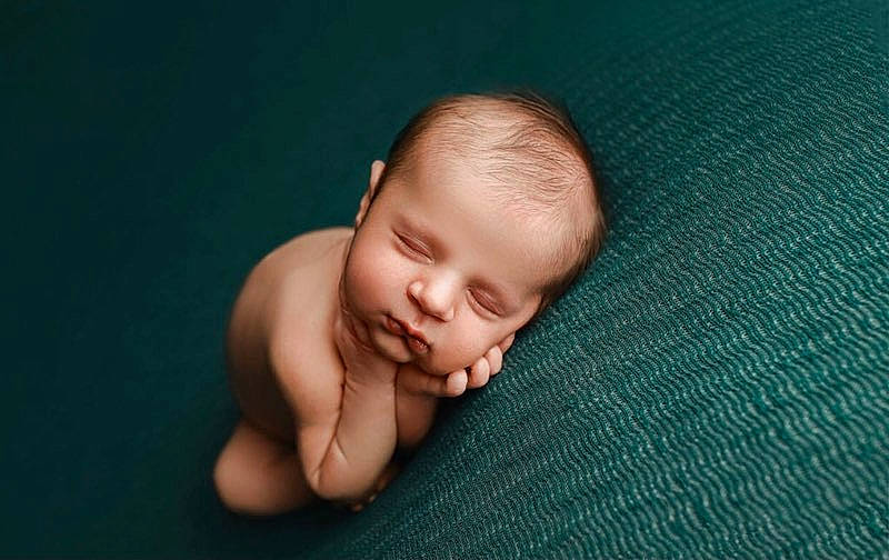Bennett Reece is registered to the contest to win money with this photo: baby, baby_toddler_clothing, cheek, child, comfort, face, flash_photography, flooring, fun, grass, happy, hardwood, head, linens, nail, nose, person, portrait_photography, sitting, toddler