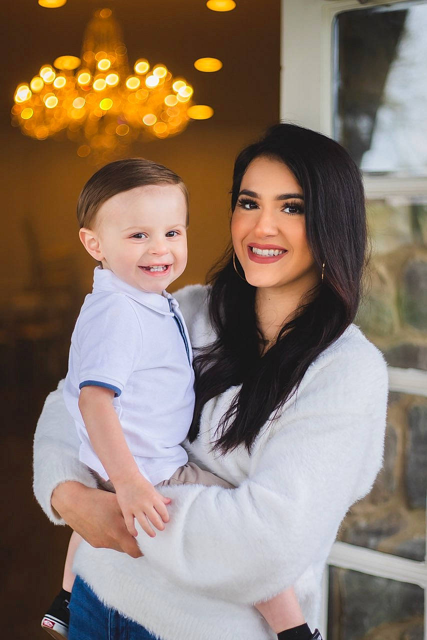 Bennett Reece is registered to the contest to win money with this photo: baby, beauty, child, event, fashion_design, flash_photography, formal_wear, fun, gesture, happy, hug, jewellery, joy, laugh, people_in_nature, person, portrait_photography, sitting, sleeve, smile