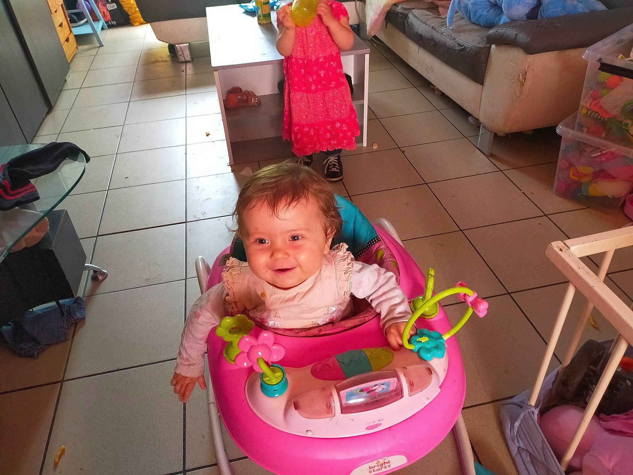 Madyson participe au concours pour gagner de l'argent avec cette photo : baby, baby_toddler_clothing, bag, cheek, floor, flooring, fun, happy, joy, leisure, luggage_and_bags, magenta, mouth, person, pink, product, riding_toy, sharing, skin, smile