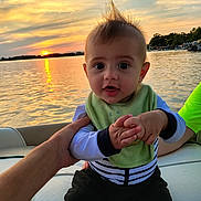 August joined the competition — help win amazing prizes! baby, bodypart, clothing, face, finger, hand, head, lake, lifejacket, nature, outdoors, person, photography, portrait, sky, summer, sun, vest, water, waterfront