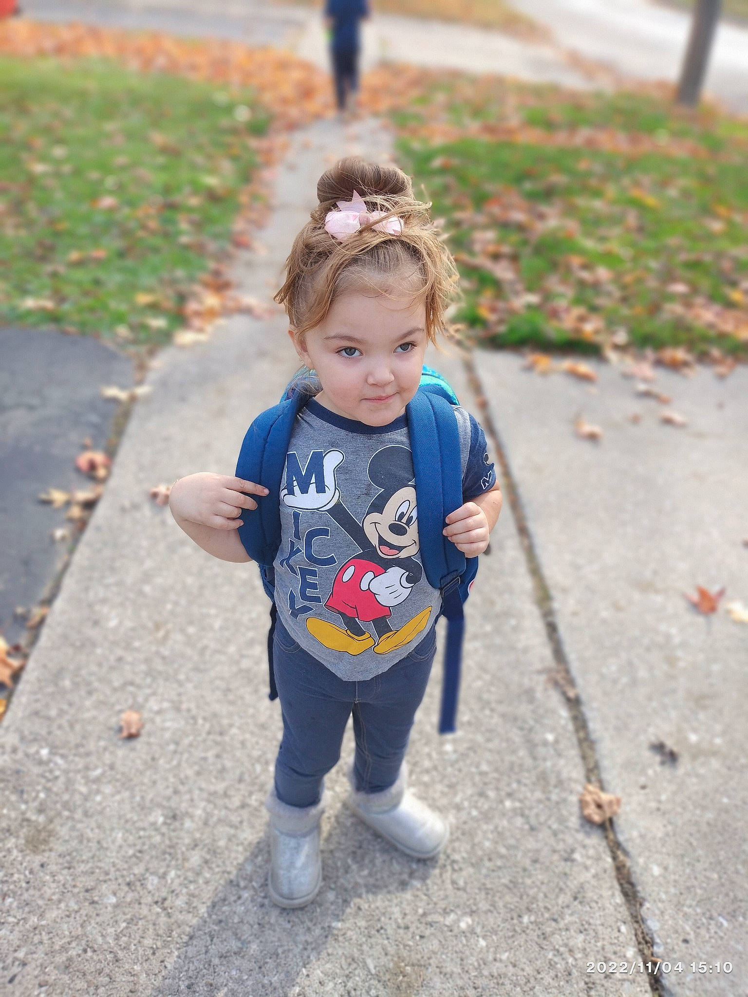 Jennifer is registered to the contest to win money with this photo: asphalt, baby, baby_toddler_clothing, child, eye, fun, grass, happy, head, leisure, pattern, person, plant, recreation, road, sidewalk, sleeve, t_shirt, toddler, tree