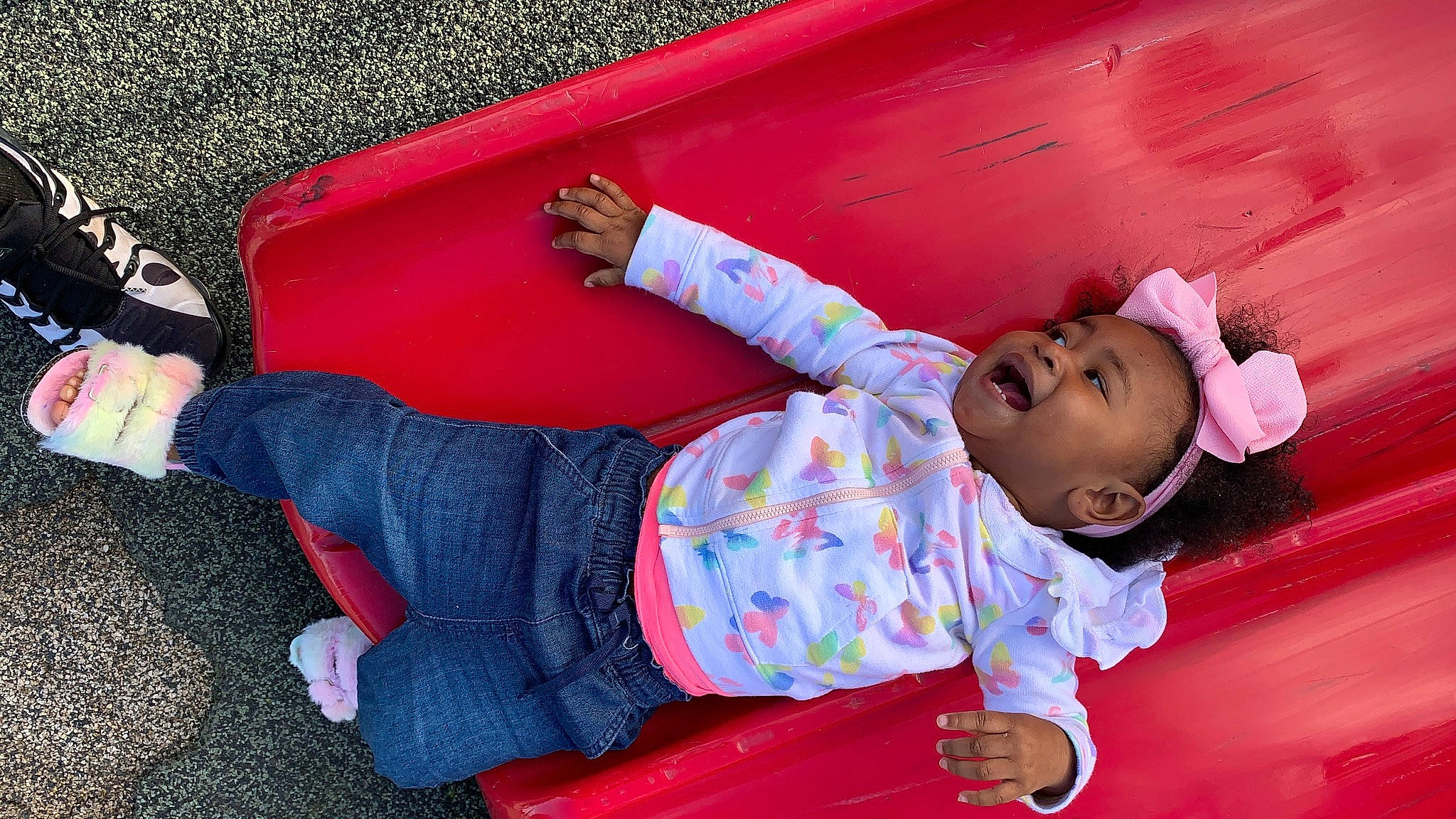 Kathryn joined the competition — help win amazing prizes! baby, baby_toddler_clothing, child, comfort, fun, grass, happy, human_leg, joint, knee, leg, leisure, magenta, person, pink, play, red, sitting, sock, thigh