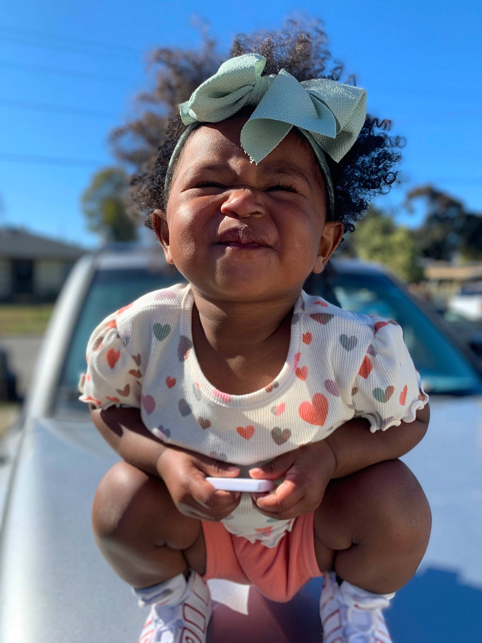 Kathryn joined the competition — help win amazing prizes! baseball_cap, cap, car, cool, eyewear, finger, fun, goggles, happy, hat, leisure, person, personal_protective_equipment, pink, recreation, sky, summer, sunglasses, toddler, vehicle_door