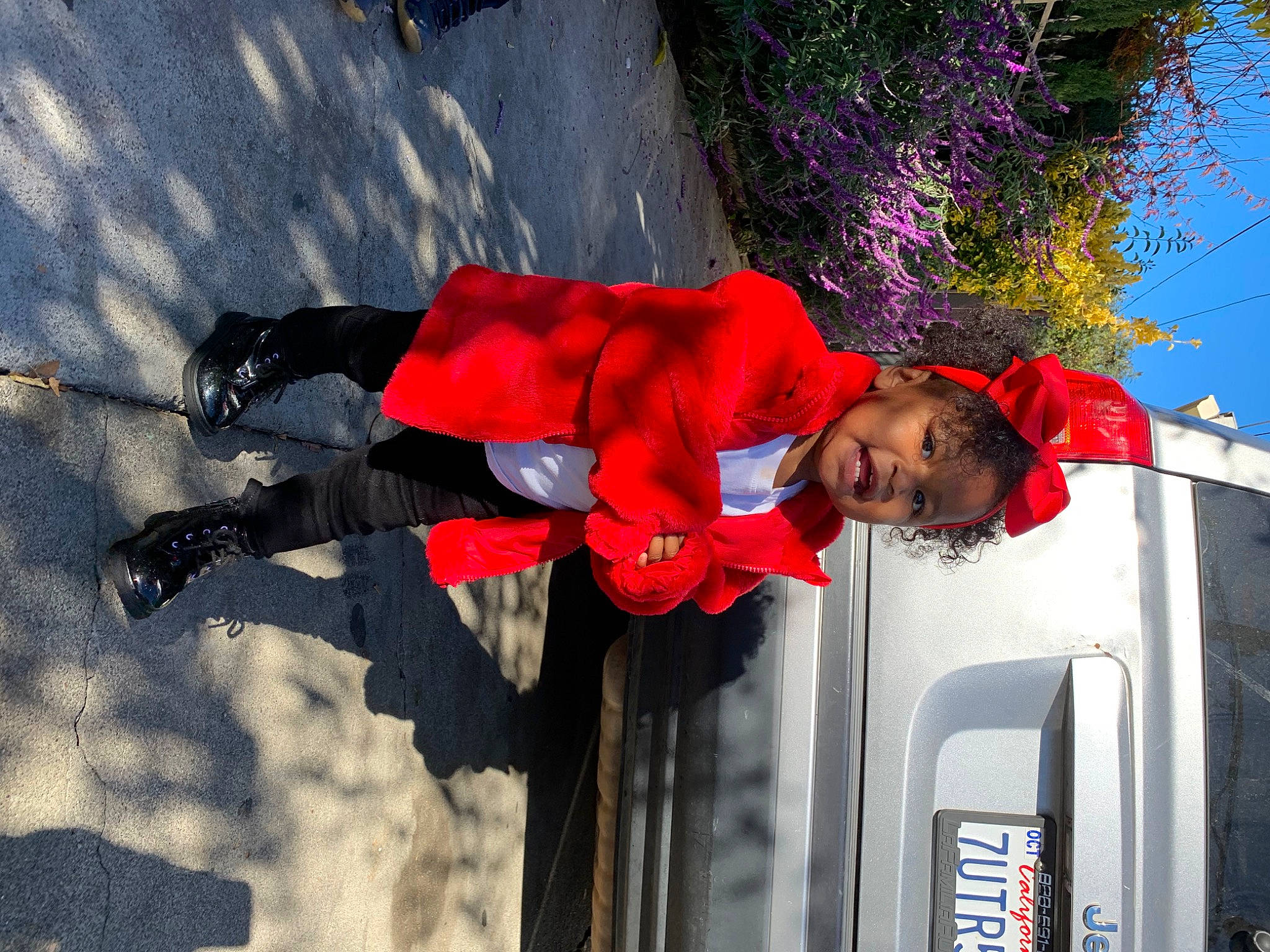 Kathryn joined the competition — help win amazing prizes! carmine, coquelicot, electric_blue, flower, fun, hat, pedestrian, person, plant, recreation, red, shadow, sky, smile, travel, tree, winter