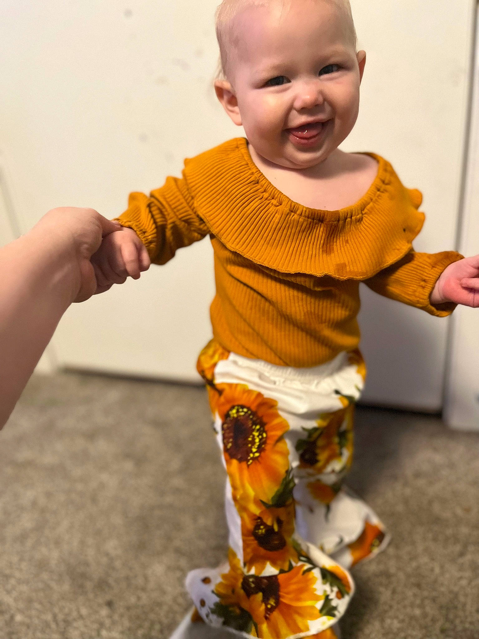 Sophie joined the competition — help win amazing prizes! art, baby, baby_toddler_clothing, child, face, fashion_design, fun, gesture, hand, happy, joy, orange, pattern, person, play, sitting, sleeve, smile, t_shirt, thumb
