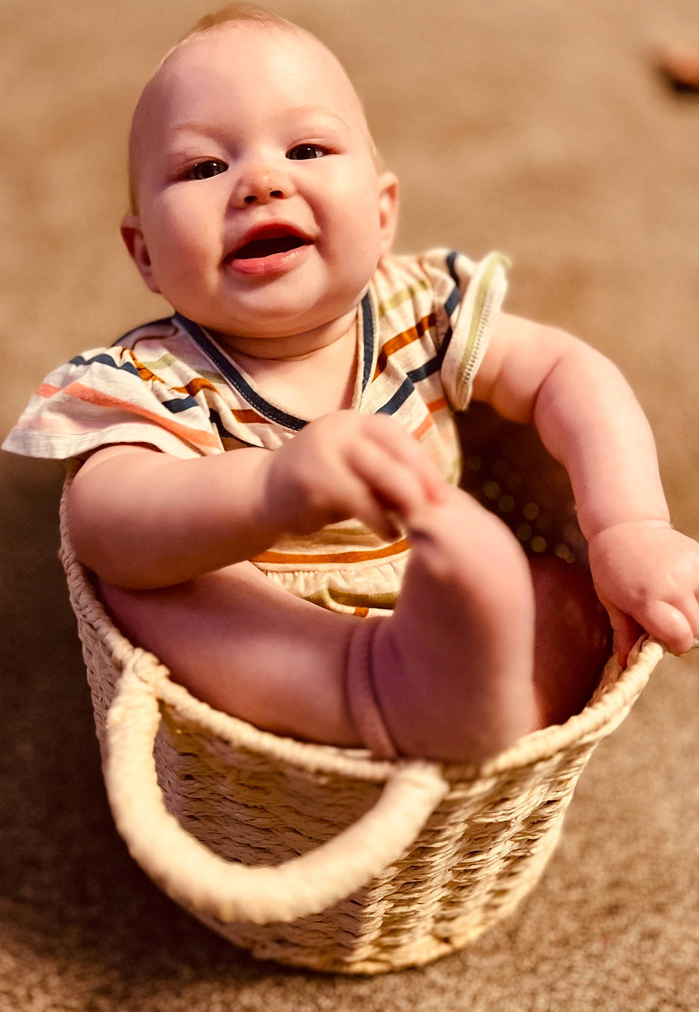 Sophie joined the competition — help win amazing prizes! baby, baby_toddler_clothing, basket, fun, gesture, happy, laugh, neck, pattern, people_in_nature, person, photograph, portrait_photography, sitting, sleeve, smile, storage_basket, thumb, toddler, wicker