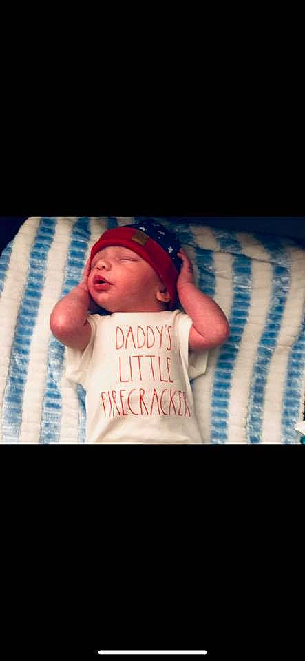 Ricky is registered to the contest to win money with this photo: abdomen, baby, baby_toddler_clothing, child, comfort, cool, elbow, electric_blue, event, finger, flash_photography, fun, hat, headwear, human_body, mouth, person, skin, t_shirt, thumb