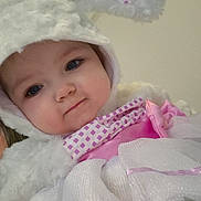 Lyanna is registered to the contest to win money with this photo: baby, child, costume, bunny, dress, pink, white, fur, ears, cute, portrait, face, blue_eyes, toddler, clothing, indoor, person, smile, soft, closeup