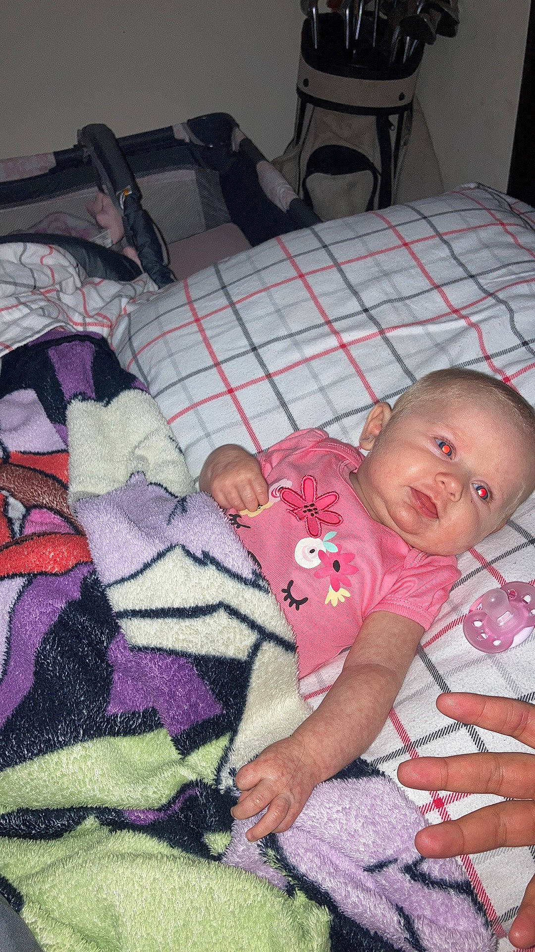Austyn is registered to the contest to win money with this photo: baby, baby_products, baby_toddler_clothing, bedding, bedtime, carmine, cheek, child, comfort, couch, flooring, lap, linens, mammal, pattern, person, pink, room, textile, toddler