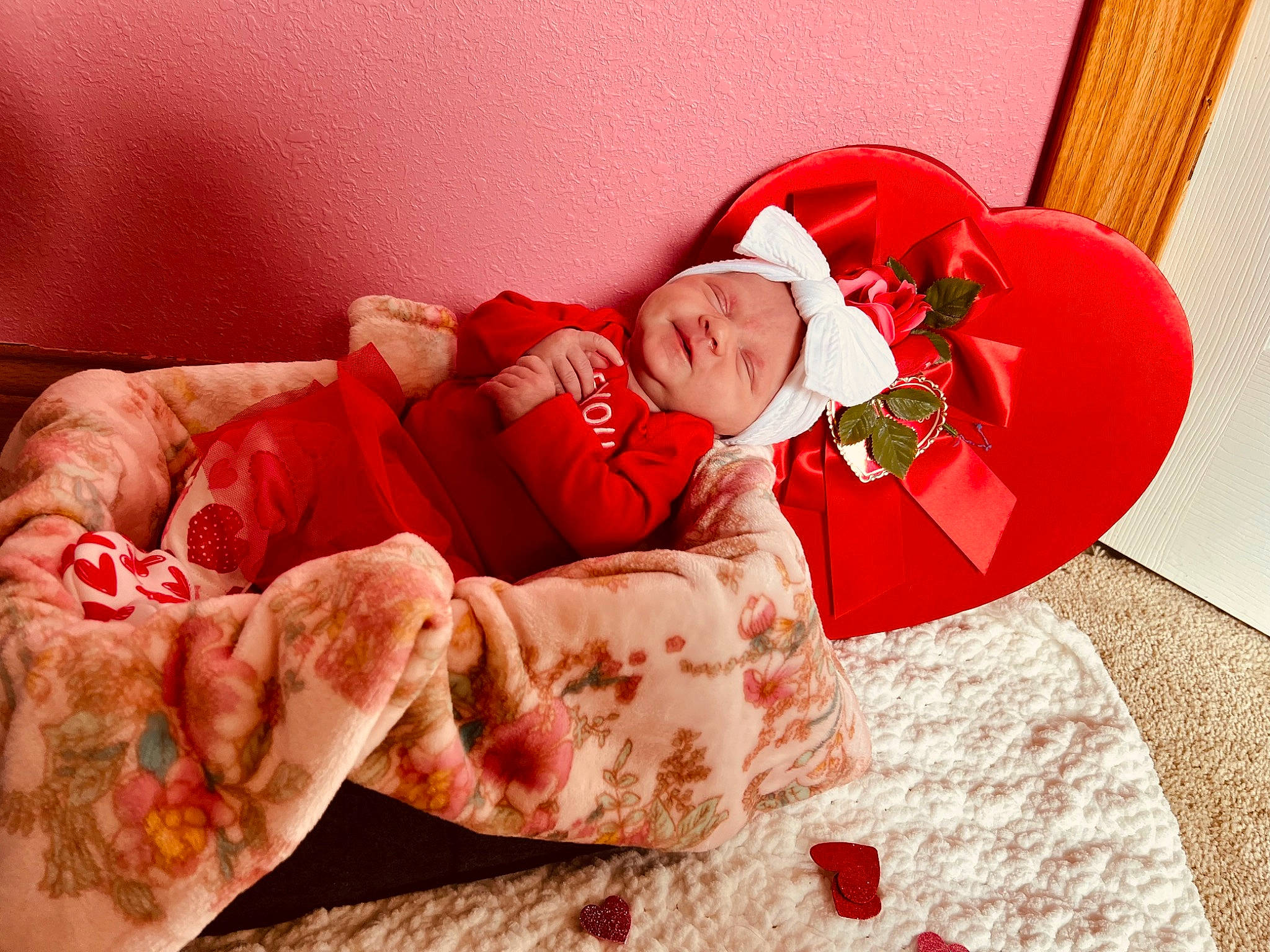 Delilah joined the competition — help win amazing prizes! baby, bedding, carmine, child, comfort, couch, event, flesh, fur, happy, hat, headwear, holiday, human_leg, linens, person, red, room, sitting, smile
