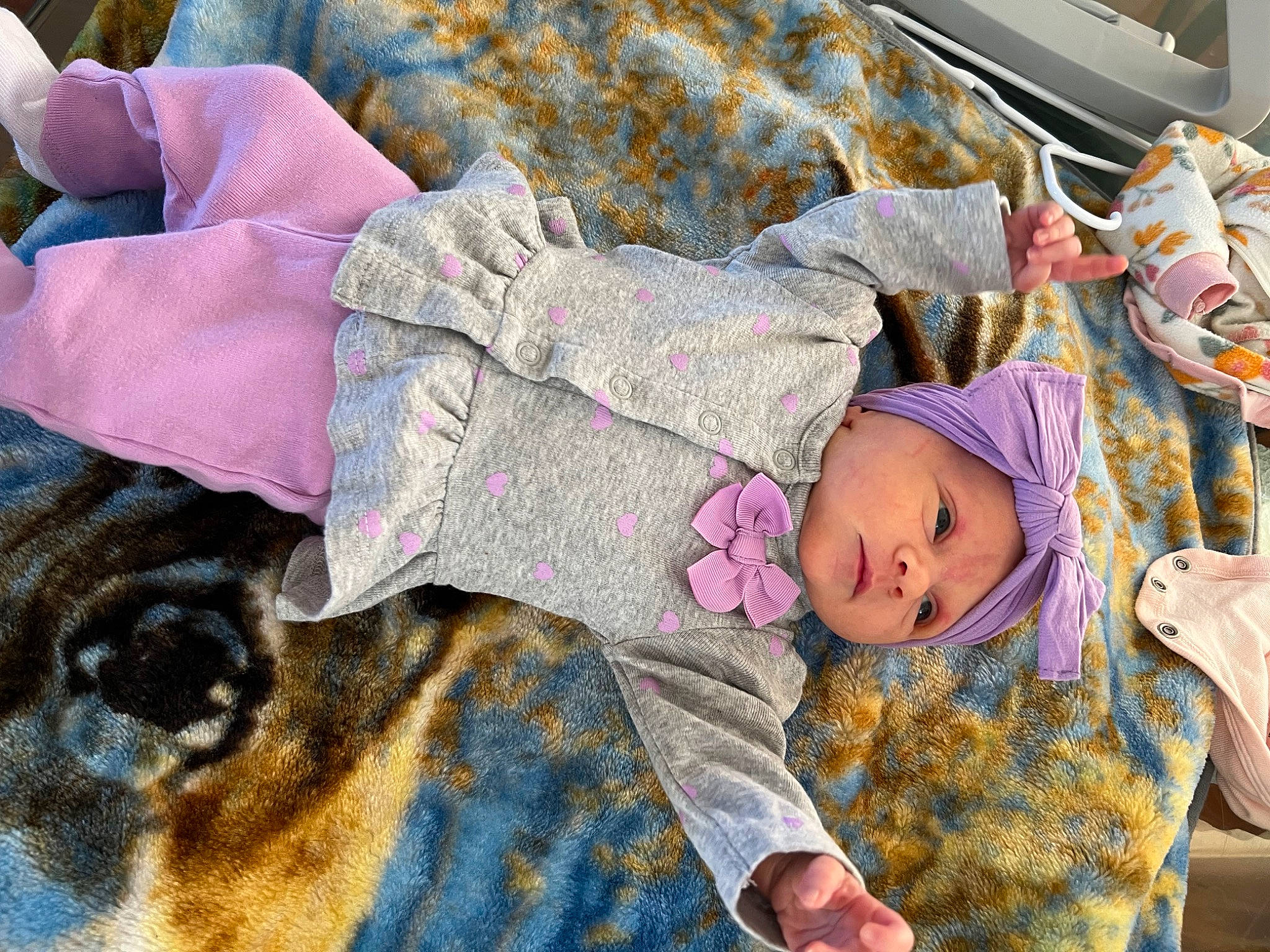 Delilah is registered to the contest to win money with this photo: baby, baby_products, baby_toddler_clothing, child, comfort, companion_dog, computer_keyboard, fur, headwear, linens, nap, pattern, people, person, room, sitting, sleep, textile, toddler, tree