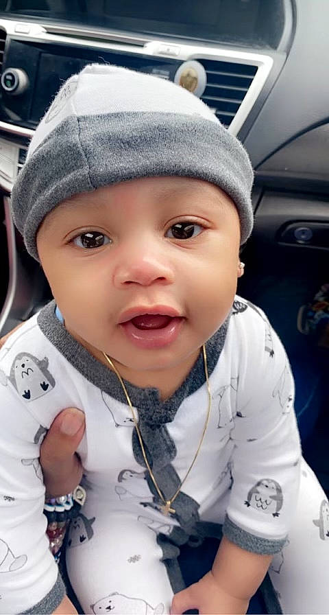 Ashton joined the competition — help win amazing prizes! automotive_design, baby, blue, cap, car_seat, cheek, child, clothing, eyebrow, gesture, happy, headgear, headwear, motor_vehicle, nose, person, skin, sleeve, smile, toddler