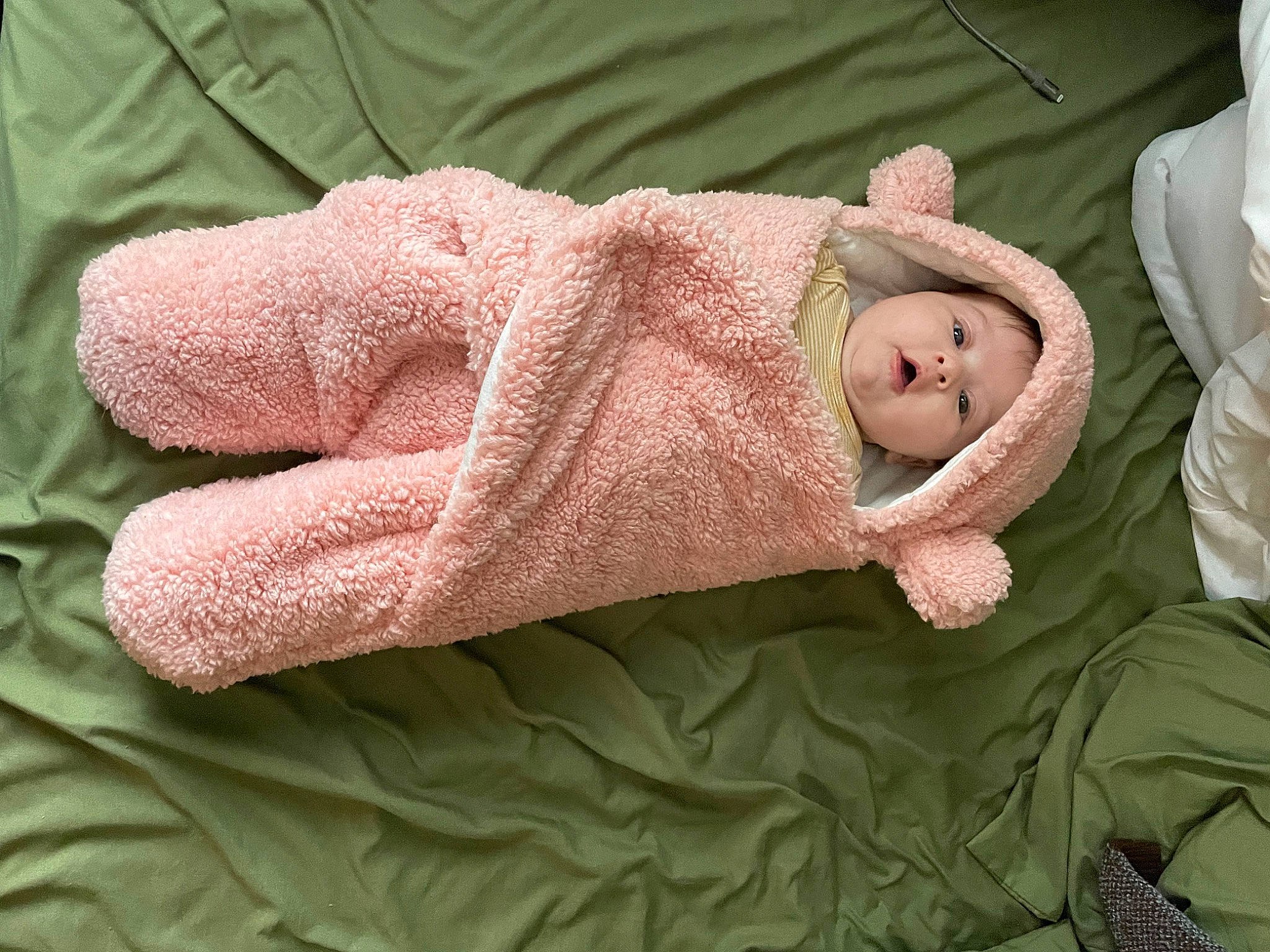 Clementine joined the competition — help win amazing prizes! baby, baby_products, baby_safety, baby_sleeping, baby_toddler_clothing, bedding, cheek, child, comfort, gesture, hat, head, headgear, headwear, human_body, linens, nail, person, sleep, sleeve