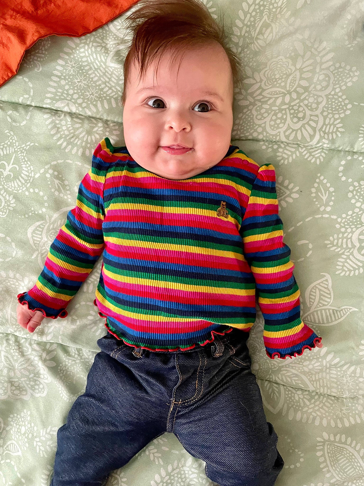 Clementine joined the competition — help win amazing prizes! baby, baby_toddler_clothing, cheek, child, chin, comfort, face, flooring, happy, head, human_body, iris, pattern, person, plaid, sitting, skin, sleeve, smile, t_shirt