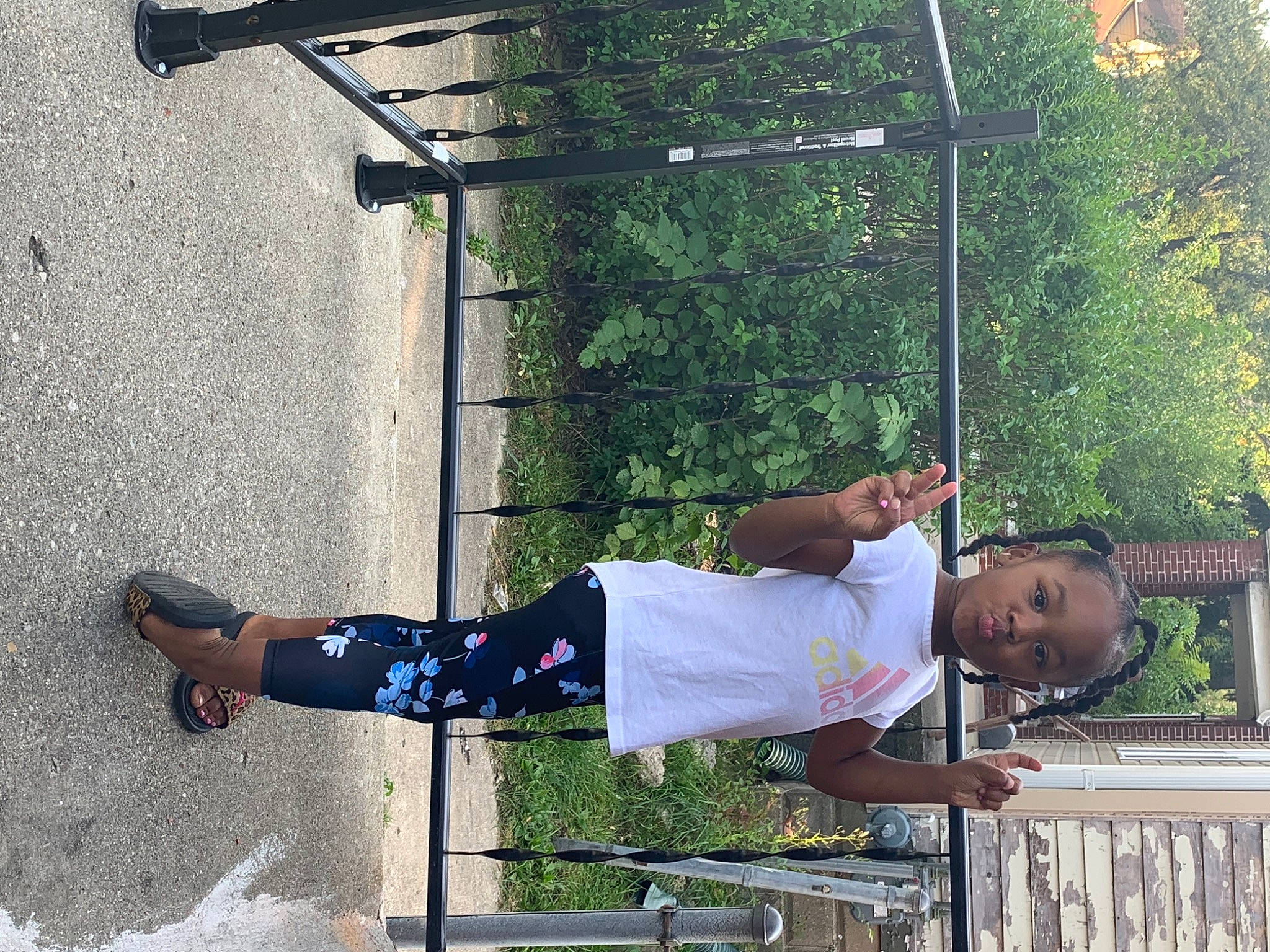 Cheyanne joined the competition — help win amazing prizes! asphalt, fun, human_leg, knee, leisure, line, metal, person, recreation, shadow, shorts, street_fashion, t_shirt, thigh, tree, walking_shoe, yellow