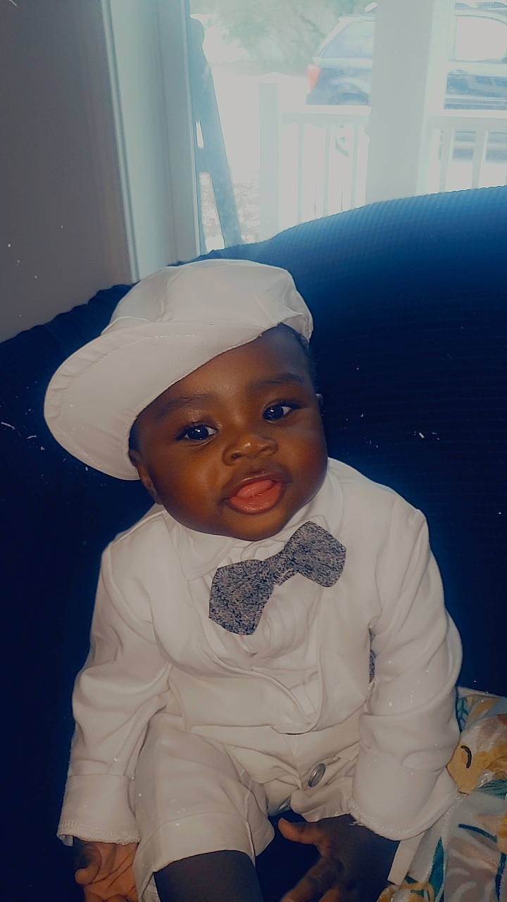 Jeremy joined the competition — help win amazing prizes! art, baby, baby_toddler_clothing, cap, cheek, child, comfort, eye, eyebrow, fun, human_body, lip, mouth, nose, person, room, sitting, skin, sleeve, toddler