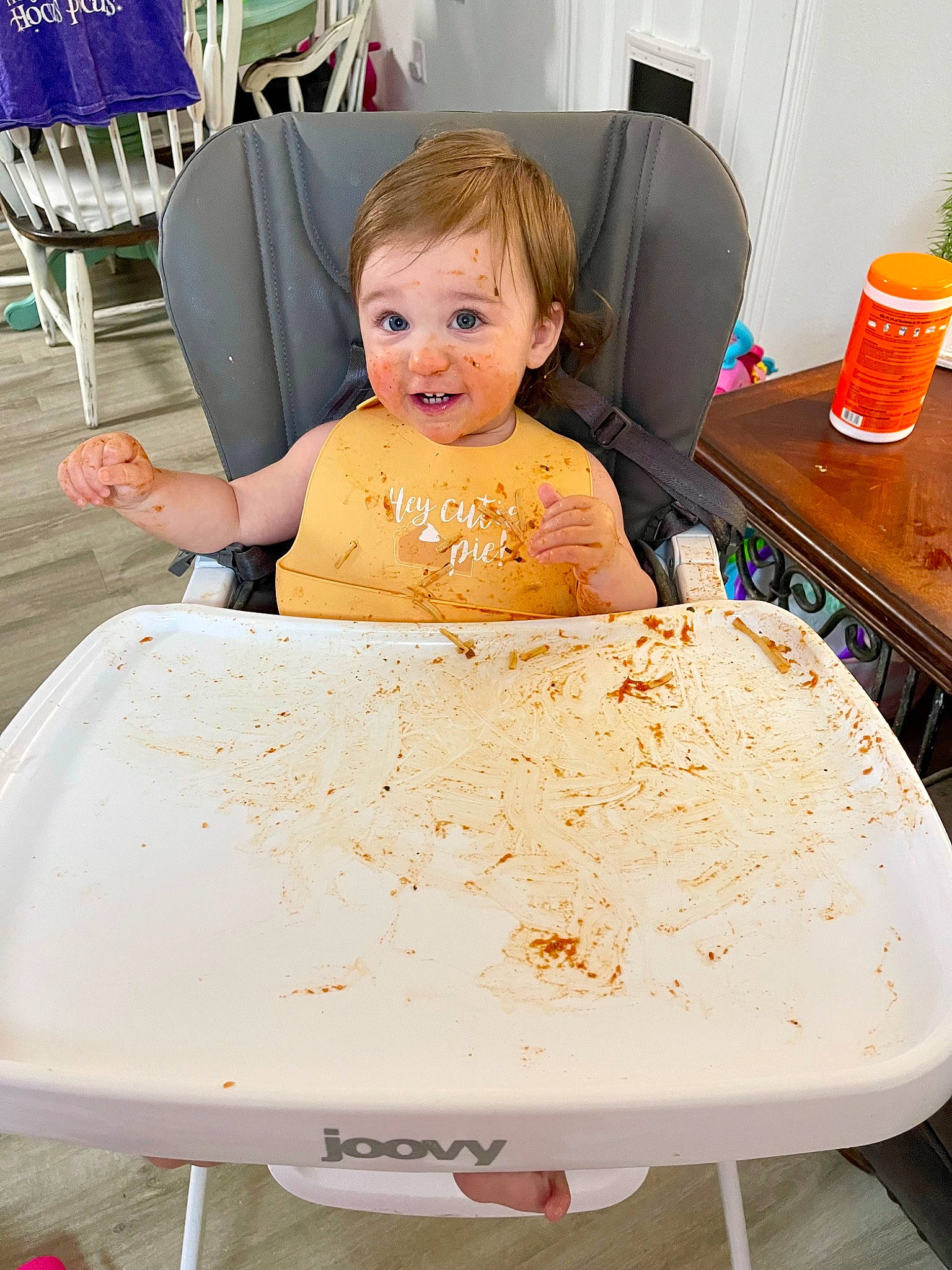 Jentry joined the competition — help win amazing prizes! baby, chair, child, cooking, eating, food, fun, furniture, leisure, person, plate, play, recipe, room, serveware, sitting, smile, t_shirt, table, tableware