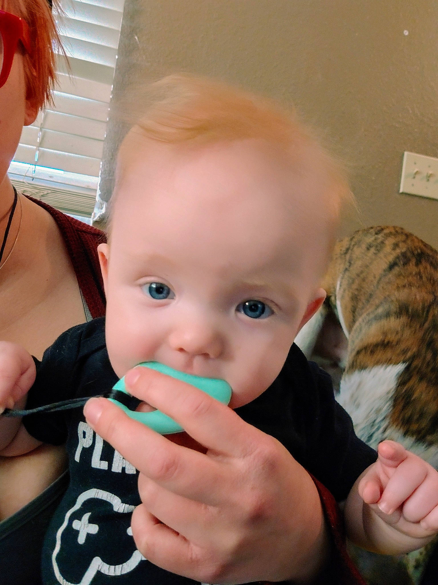 Evander is registered to the contest to win money with this photo: arm, baby, baby_toddler_clothing, carnivore, cheek, ear, eyebrow, eyelash, finger, gesture, hand, happy, iris, lip, mouth, nose, person, skin, thumb, toddler