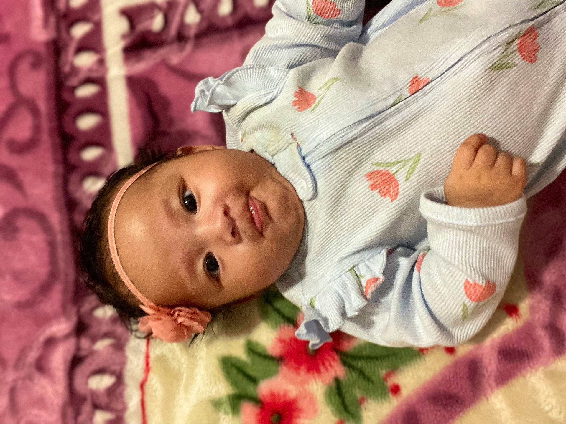 baby, babylaughing, blanket, bodypart, clothing, face, finger, furniture, hand, happy, hat, head, newborn, pajamas, person, photography, portrait, quilt, sleeve, smile