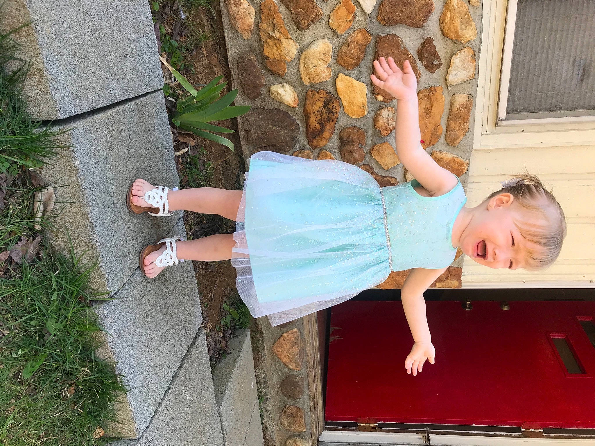 Heavenly is registered to the contest to win money with this photo: day_dress, dress, foot, fun, grass, happy, human_leg, joint, leg, leisure, person, plant, sandal, sitting, smile, sorrow, street_fashion, thigh, toddler, tree