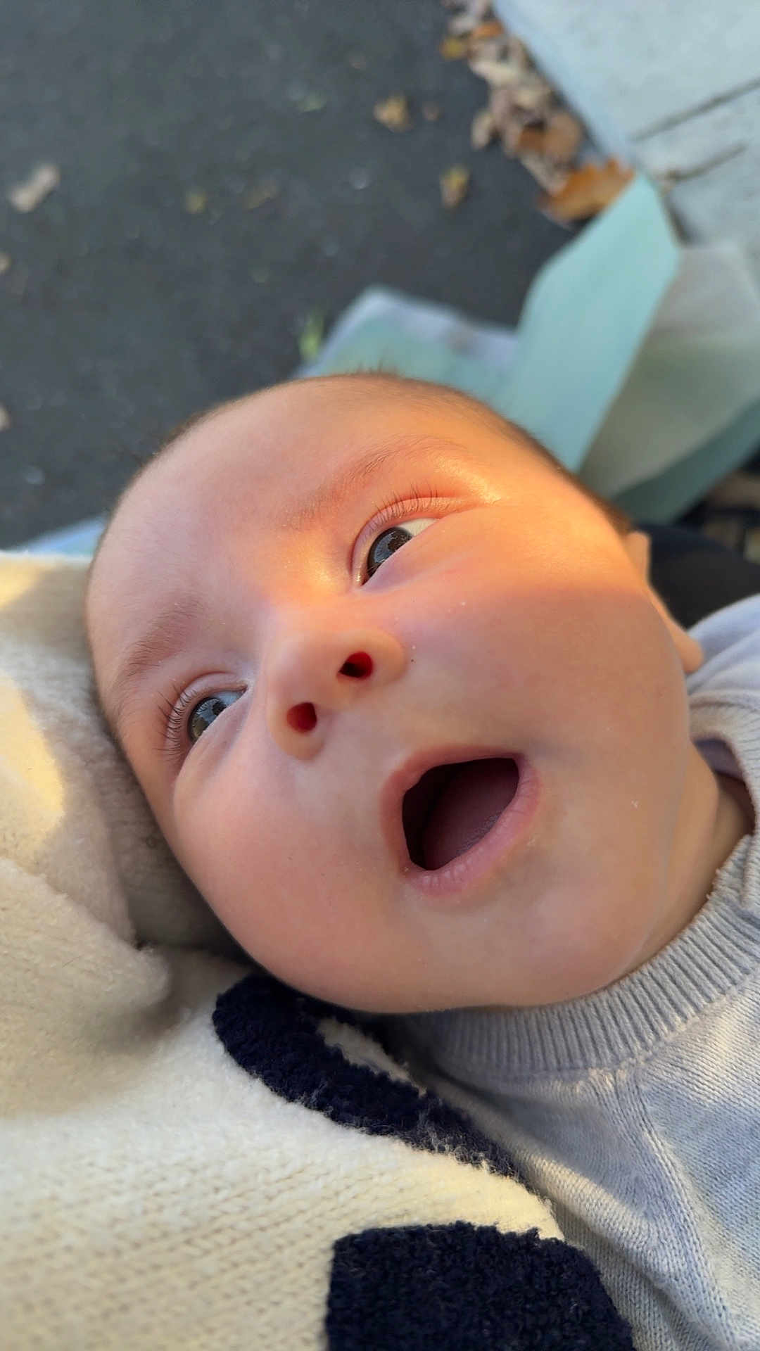 Roman joined the competition — help win amazing prizes! baby, close_up, face, eyes, blanket, infant, expression, curious, skin, mouth_open, child, warm_clothing, outdoor, soft_light, head, person, young, cute, portrait, newborn