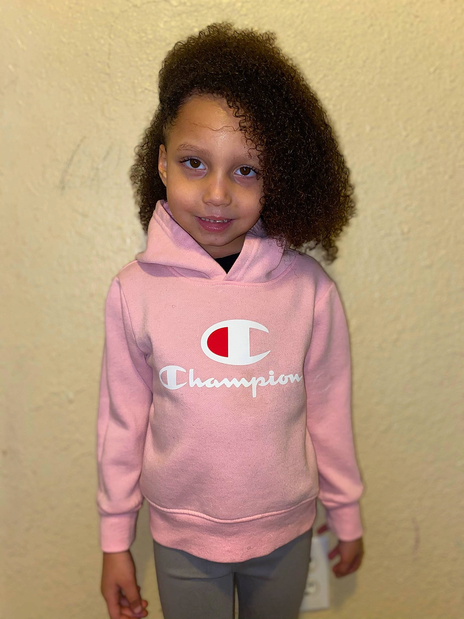 Ceyonnie is registered to the contest to win money with this photo: afro, brown_hair, cool, fashion_design, hair, jacket, jheri_curl, joy, lip, long_hair, long_sleeved_t_shirt, magenta, neck, outerwear, person, pink, sleeve, sportswear, t_shirt, toddler