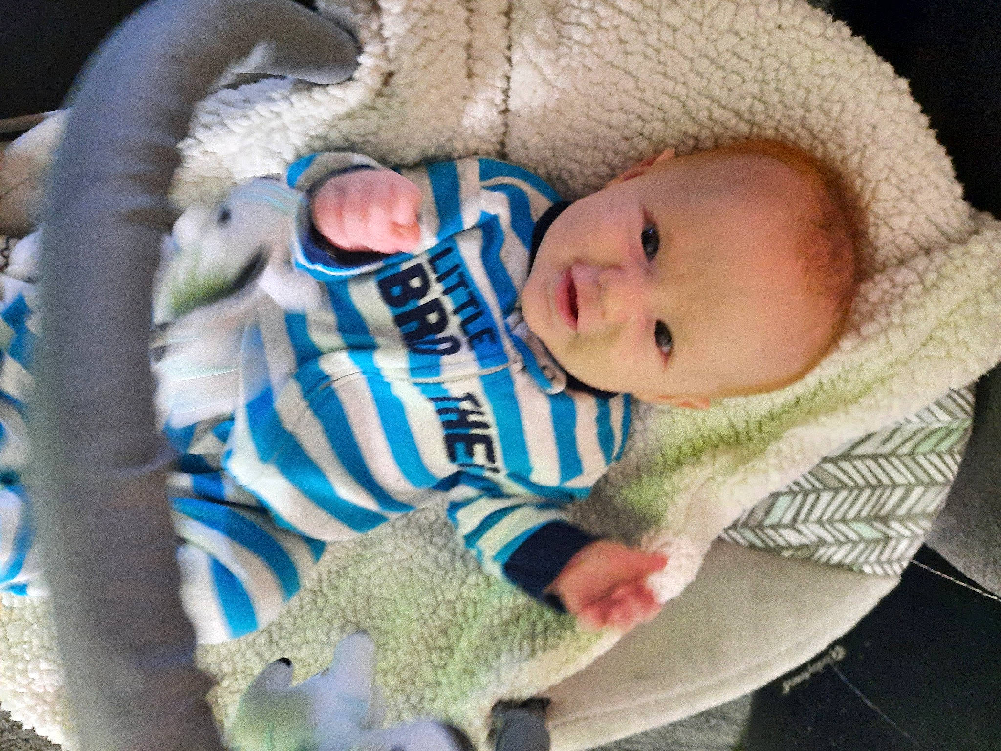 Kaisyn is registered to the contest to win money with this photo: baby, baby_products, baby_toddler_clothing, cap, cheek, child, clothing, comfort, face, grass, hat, iris, knit_cap, mammal, person, skin, sleeve, toddler, vertebrate, wool