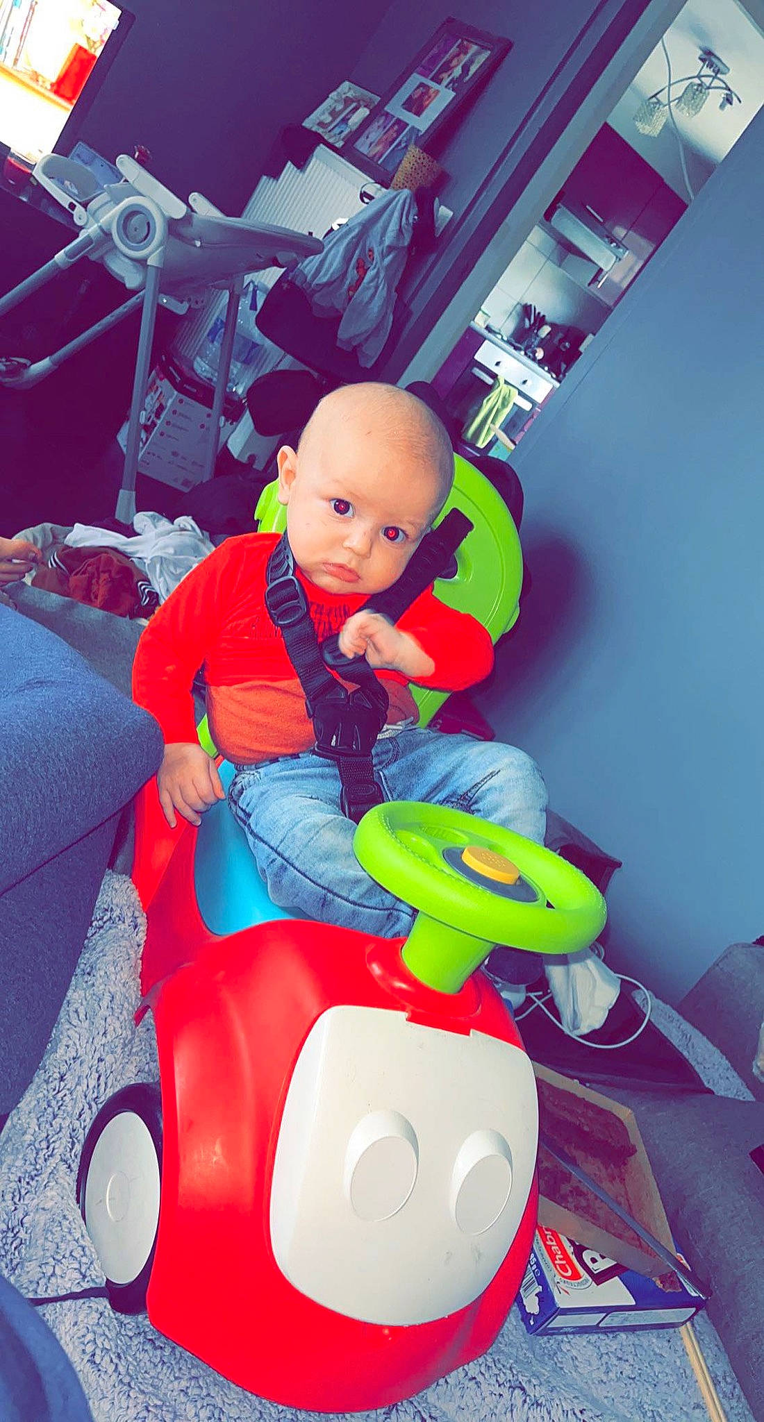 Emilyo participe au concours pour gagner de l'argent avec cette photo : automotive_design, baby, baby_products, baby_toddler_clothing, baby_toys, carmine, child, electric_blue, fictional_character, fun, lap, machine, magenta, person, plastic, recreation, riding_toy, sitting, toddler, toy