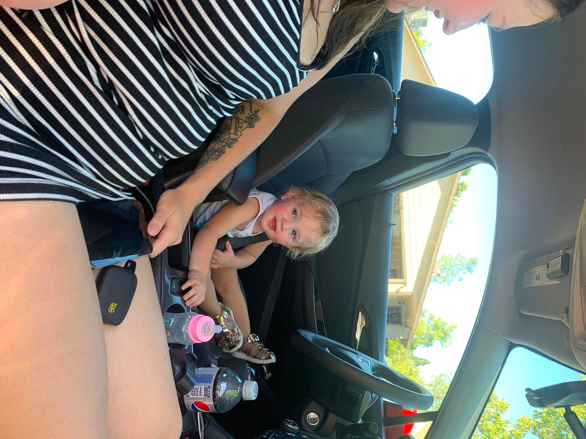 Haisleigh is registered to the contest to win money with this photo: air_travel, airline, auto_part, automotive_design, automotive_exterior, automotive_window_part, elbow, event, eyewear, family_car, fun, head_restraint, human_leg, knee, leisure, motor_vehicle, person, recreation, thigh, vehicle