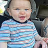 Beau joined the competition — help win amazing prizes! baby, child, hat, striped_shirt, smile, blue_eyes, car_interior, seat, tattoo, person, happy, clothing, sitting, hand, lap, casual, cute, portrait, sunlight, infant