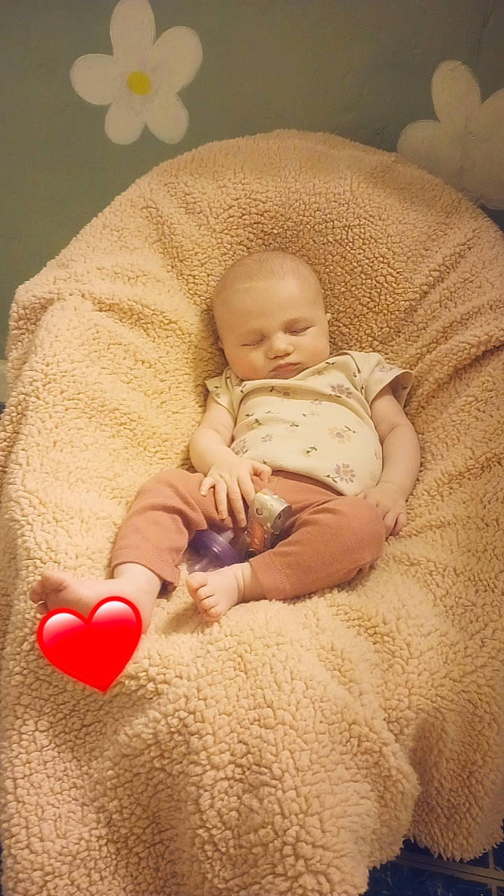 Adeline joined the competition — help win amazing prizes! arm, baby, baby_sleeping, baby_toddler_clothing, cheek, chin, comfort, eye, face, facial_expression, finger, hand, head, human_body, linens, mouth, nose, person, skin, textile