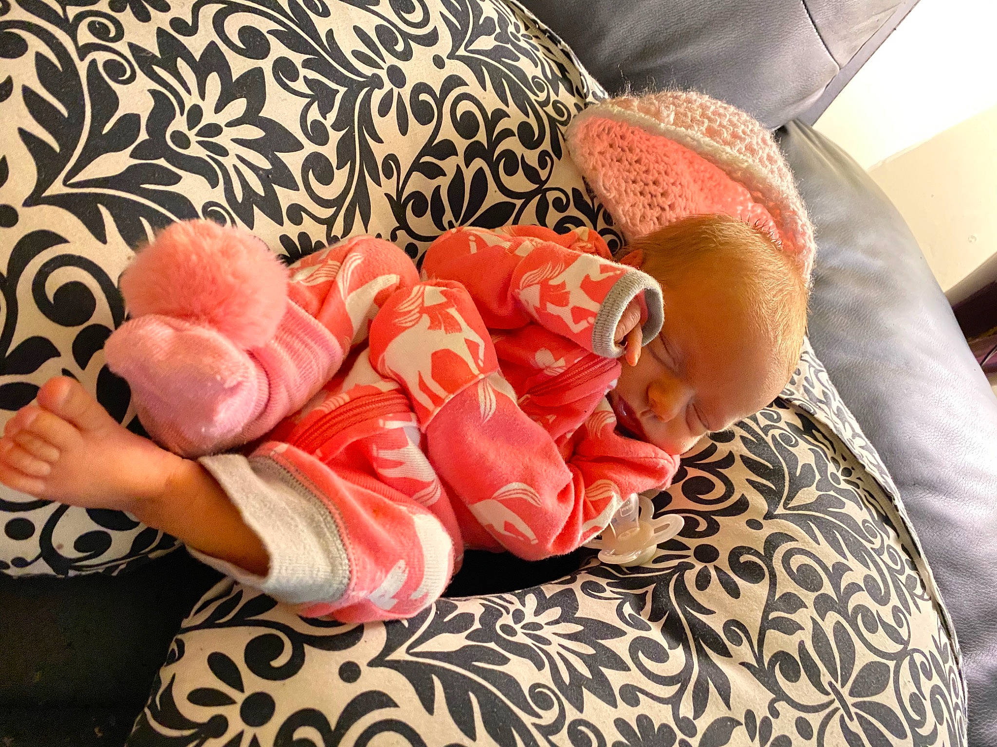 Eden is registered to the contest to win money with this photo: baby, bedding, birth, child, finger, flesh, foot, fur, furniture, hand, leg, linens, nap, peach, person, pink, stuffed_toy, textile, toddler