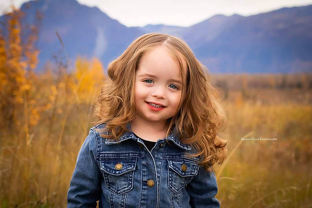 Lennox joined the competition — help win amazing prizes! beauty, blond, child, emotion, eye, facial_expression, fun, girl, hair, happiness, human_hair_color, joy, long_hair, mountainous_landforms, person, photograph, photography, portrait_photography, sky, smile