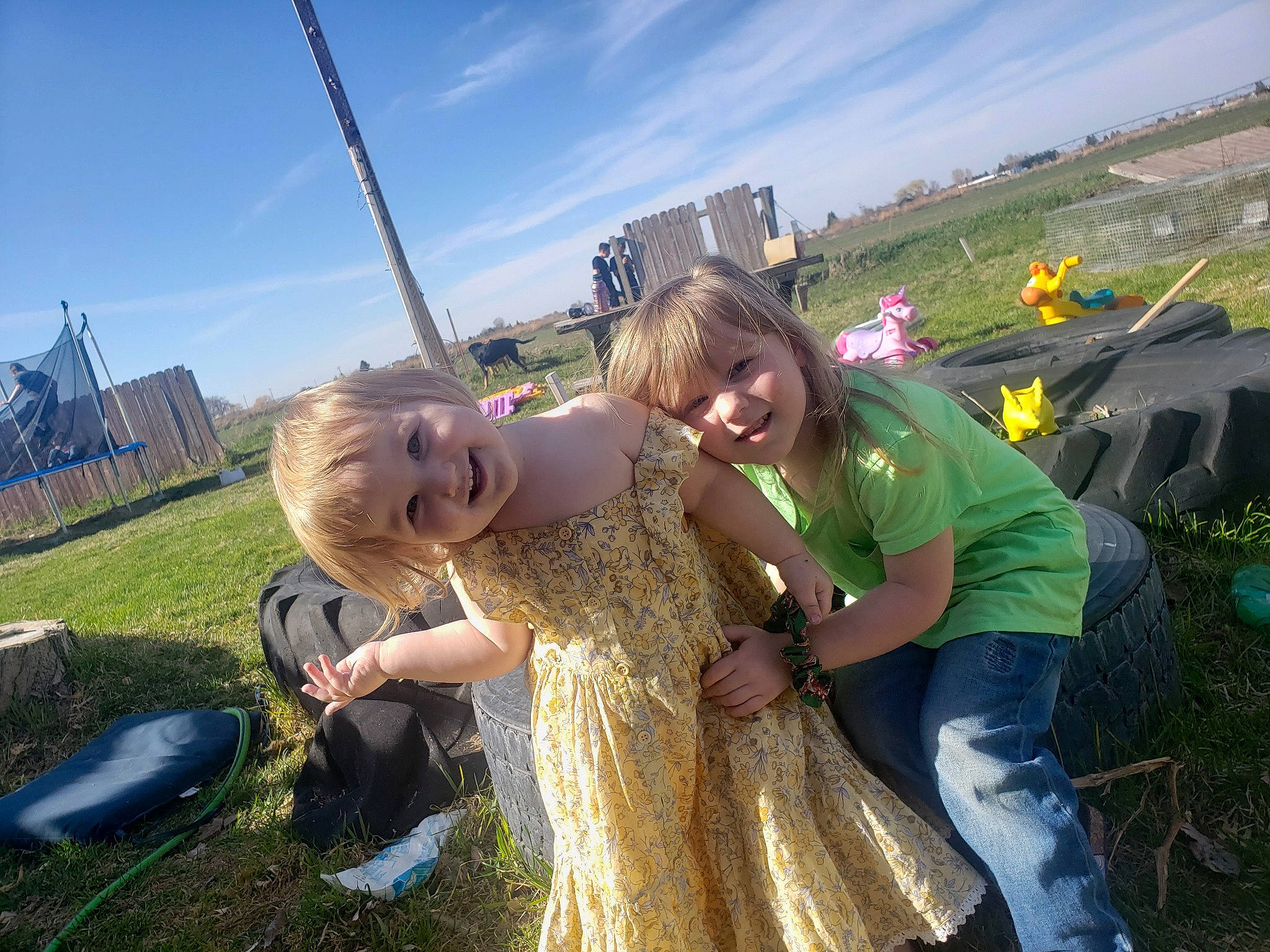 Lucille is registered to the contest to win money with this photo: cloud, event, fun, gesture, grass, grassland, happy, joy, landscape, leisure, people_in_nature, person, plant, recreation, sky, smile, summer, sunlight, toddler, travel