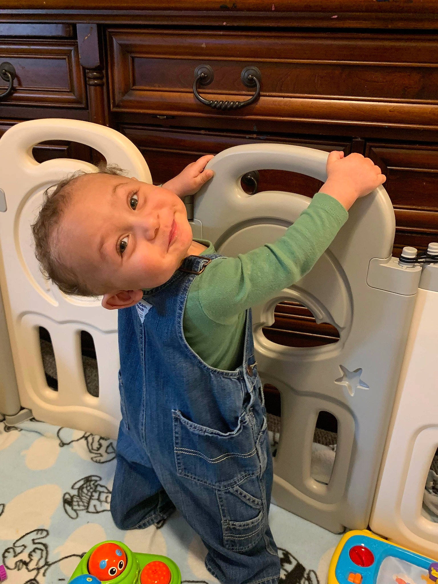Knowledge is registered to the contest to win money with this photo: baby, baby_products, baby_safety, baby_toddler_clothing, cabinetry, child, comfort, fun, hearing, home_appliance, kitchen, kitchen_appliance, laundry_room, machine, major_appliance, person, play, room, smile, toddler